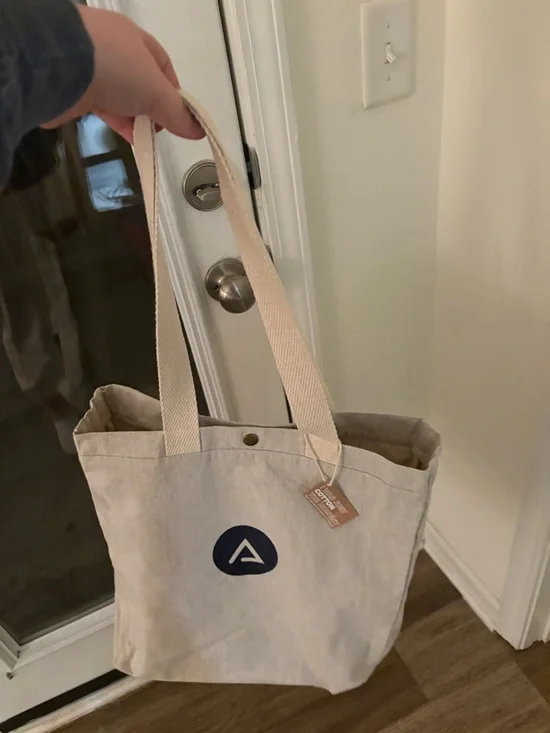 Neutral Canvas Tote Bag with Navy Logo - Picture 3 of 4